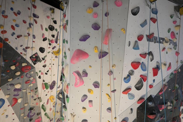 Artificial climbing wall with Colourful grip rocks