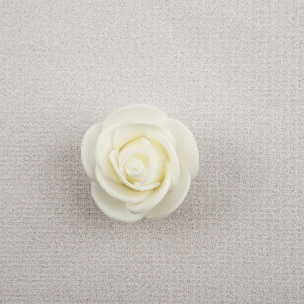 Artificial flowers on white background