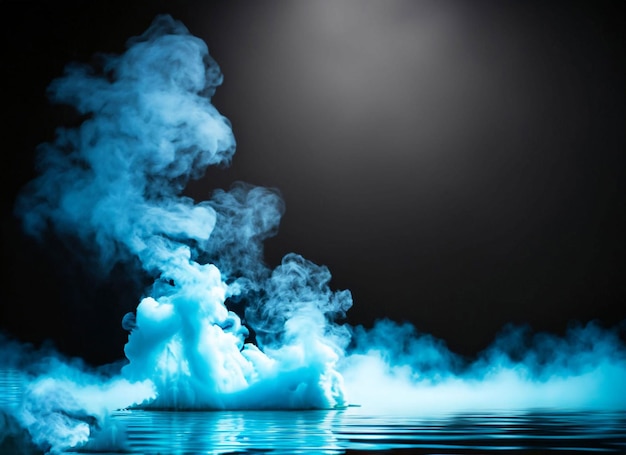 Photo artificial smoke blue light in water black background in darkness