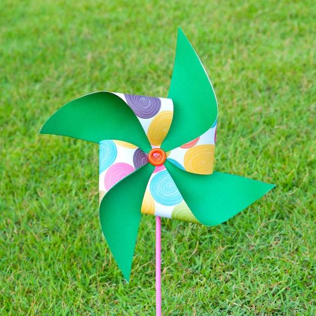 Artificial wind turbine colors embroidered on the lawn