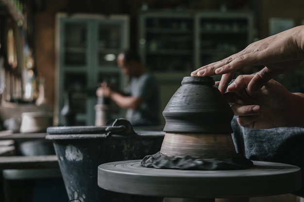 Artisan potter making art pot handicraft