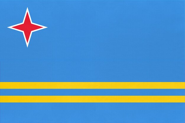 Aruba national fabric flag textile background. State official caribbean sign.