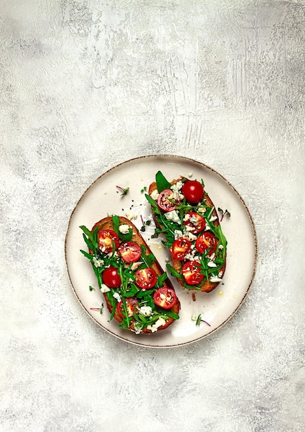 arugula sandwiches and cherry tomatoes cheese with mold breakfast snack homemade