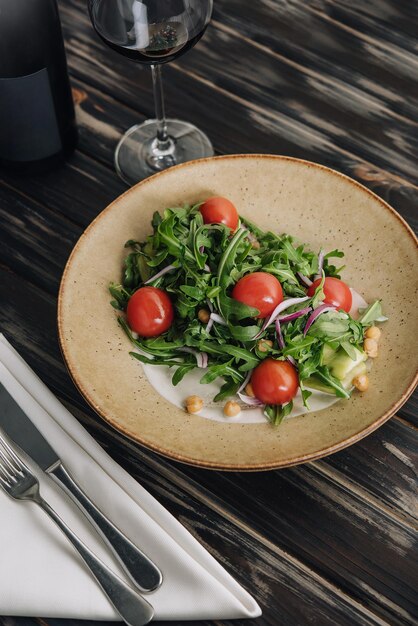 Arugula tomato salad with pine nuts