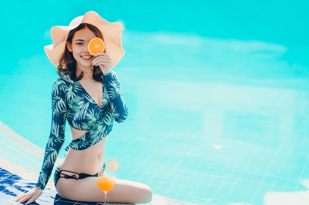 Asain women with bikini enjoy summer vacation 