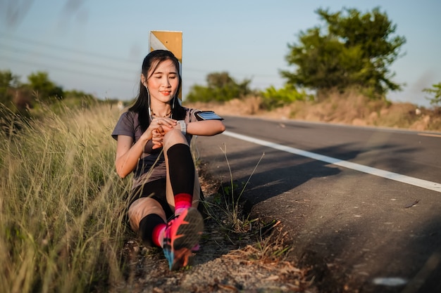 Asia beautiful woman in sport ware exercising and warm up for running