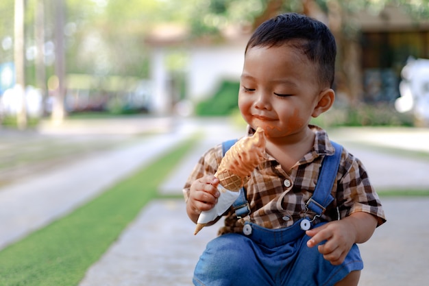 Asia toddler boy kid playing outdoor