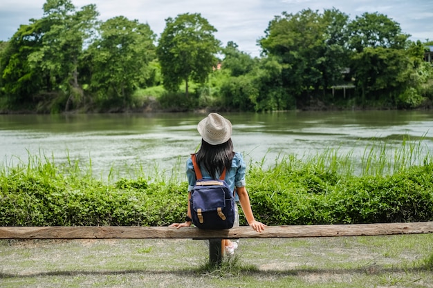 Asia woman looking at the river in relax time