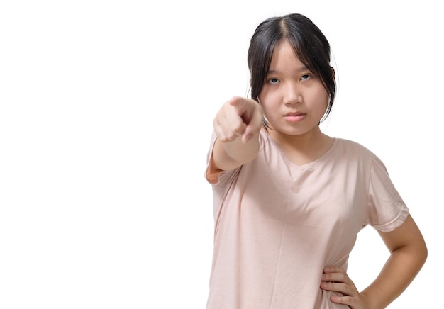 Asian angry enraged girl wearing Tshirt pointing at you scolding warning making reprimand accusing you in bad results being dissatisfied with your behavior copy space