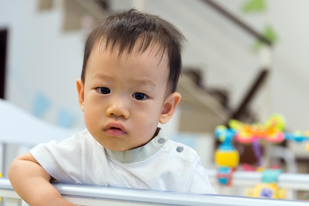 Asian baby cute boy in crib