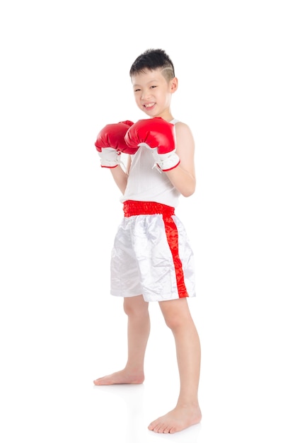 Asian boxer boy standing over white background