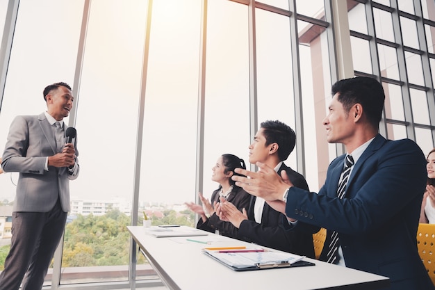 Asian Business men trainer giving presentation