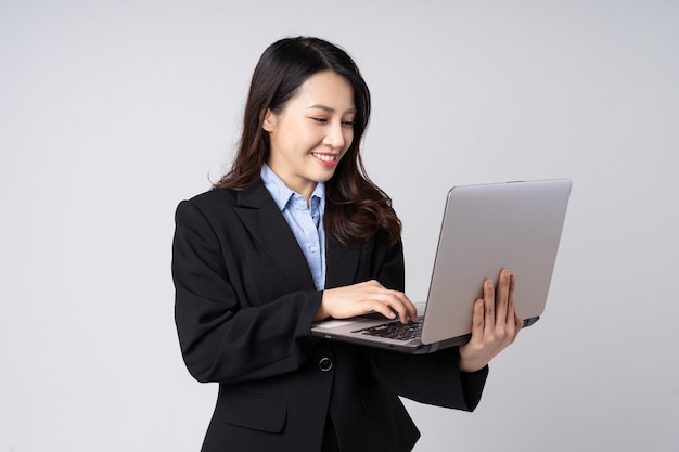 Asian businesswoman portrait, isolated on white background