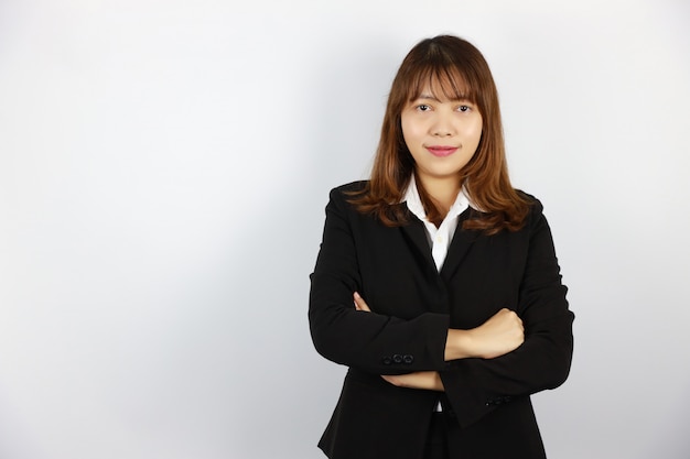 Asian businesswoman wearing black suit with confident face on white