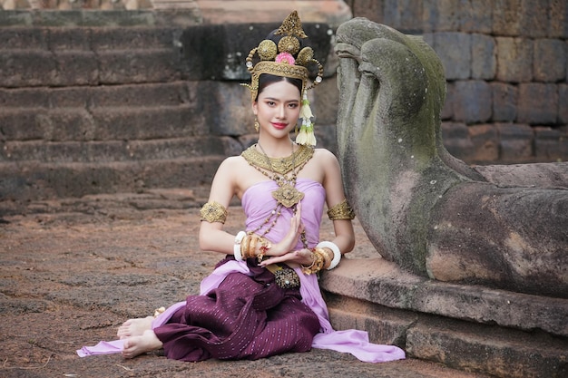 Asian charming woman wearing typical Thai dress identity culture