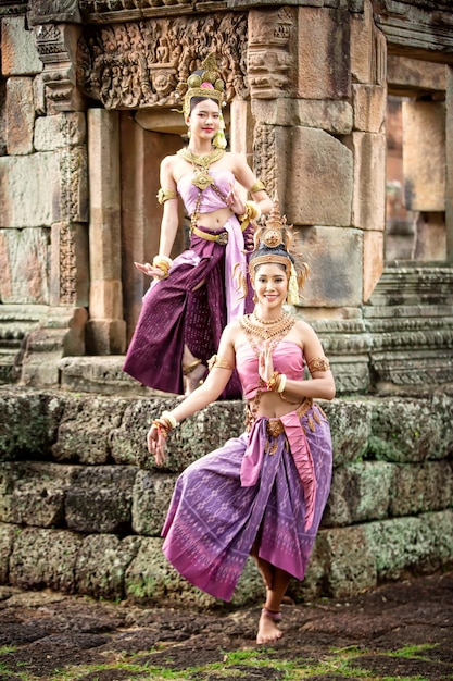 Asian charming woman wearing typical Thai dress identity culture