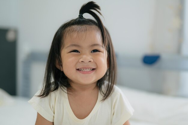 Asian child cute girl smiling at home