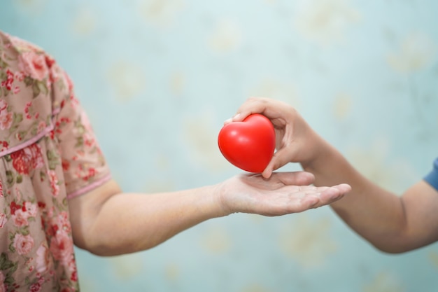 Asian children young kid give red heart