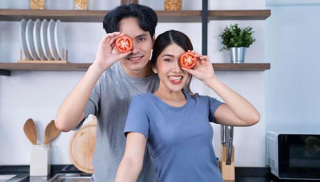 asian couple at kitchen