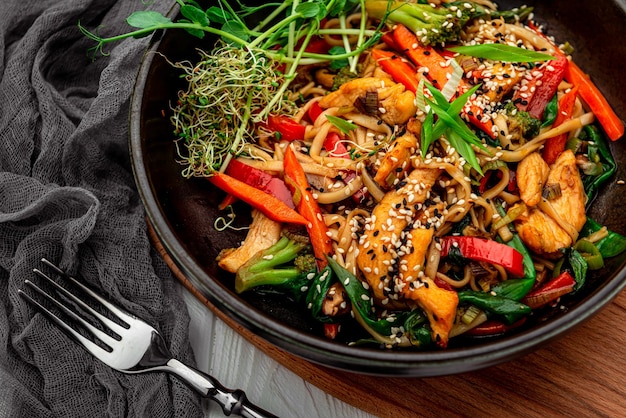 Asian dish noodles with chicken and vegetables