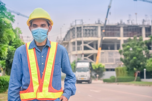 Asian Engineer standing outdoor on site construction posting confident Engineer construction