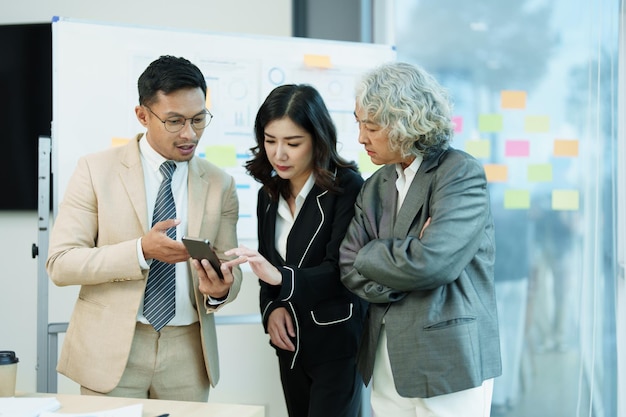 Asian entrepreneurs and business people meeting in a conference room in business planning financial budget and investment risk assessment to analyze customer groups to increase company growth