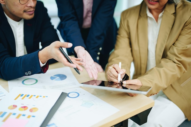 Asian entrepreneurs and business people meeting in a conference room in business planning financial budget and investment risk assessment to analyze customer groups to increase company growth