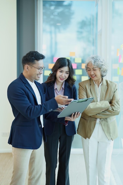 Asian entrepreneurs and business people meeting in a conference room in business planning financial budget and investment risk assessment to analyze customer groups to increase company growth