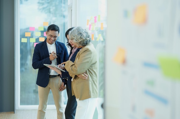 Asian entrepreneurs and business people meeting in a conference room in business planning financial budget and investment risk assessment to analyze customer groups to increase company growth