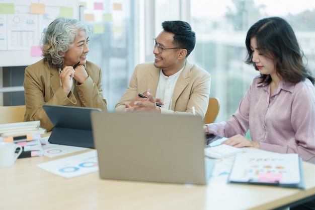 Asian entrepreneurs and business people meeting in a conference room in business planning financial budget and investment risk assessment to analyze customer groups to increase company growth