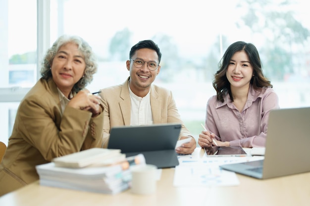 Asian entrepreneurs and business people meeting in a conference room in business planning financial budget and investment risk assessment to analyze customer groups to increase company growth