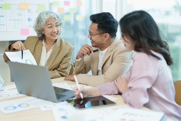 Asian entrepreneurs and business people meeting in a conference room in business planning financial budget and investment risk assessment to analyze customer groups to increase company growth