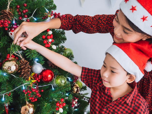 Asian family celebrating Christmas in house