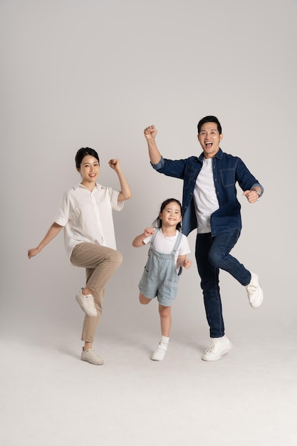 Asian family portrait posing on white background