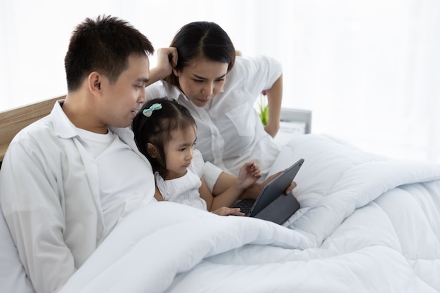 Asian family with a digital tablet