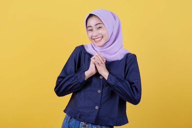 The asian girl who was very happy by wearing the hijab with incredible surprise