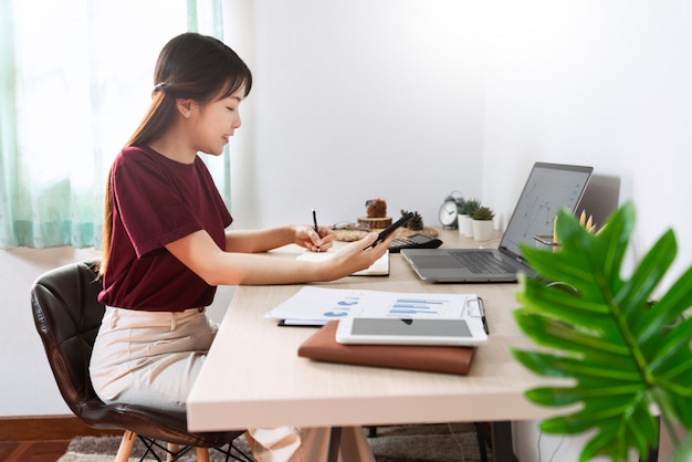 Asian girl working remotely from home