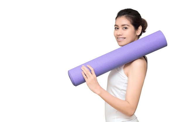 Asian healthy woman with yoga mat isolated with clipping path on white background