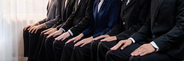 Asian job applicant waiting in line with good manners hand gesture Trailblazing