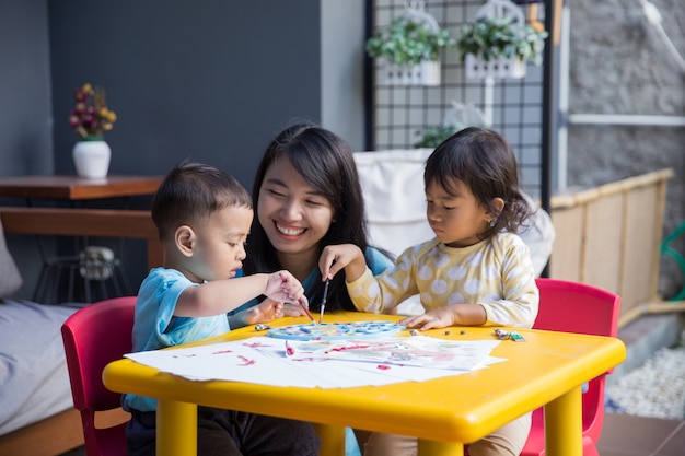 Asian kids painting and drawing