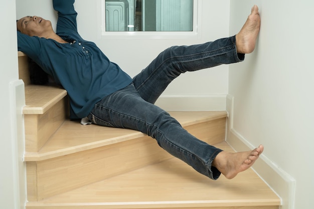 Asian lady woman patient fall down the stairs because slippery surfaces