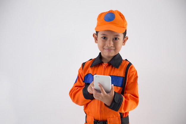 Asian little boy with technician, engineer or astronaut uniform