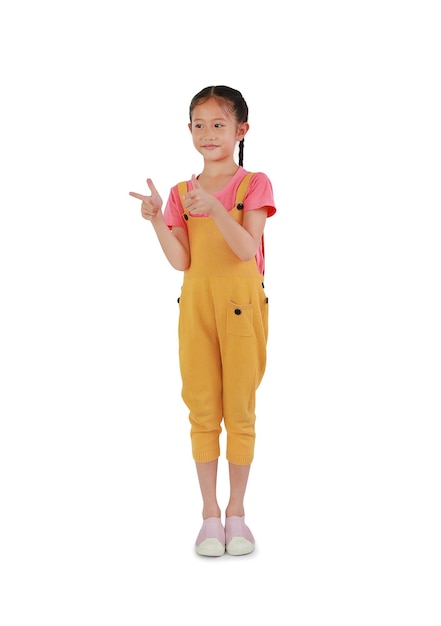 Asian little girl kid gesture finger pointing and look at beside isolated on white background Image full length with Clipping path