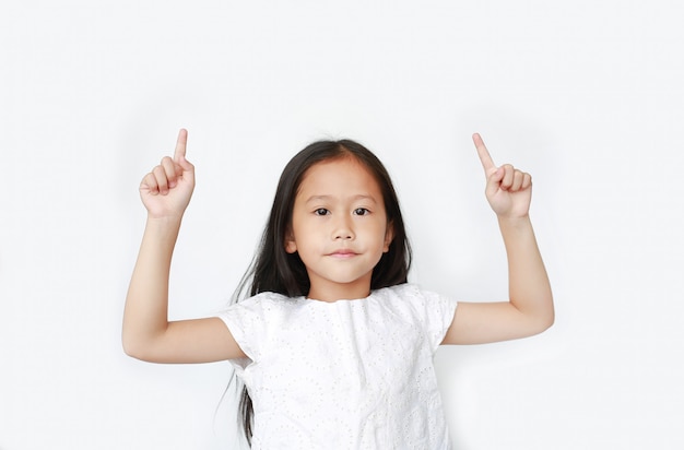 Asian little girl raised two forefinger to cheer