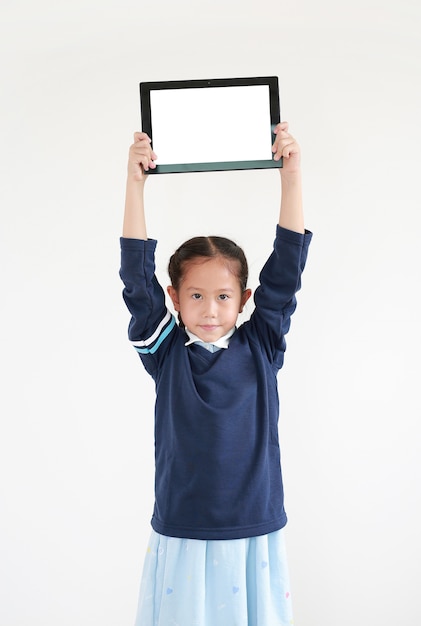 Asian little girl using a tablet