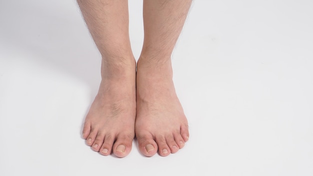 Asian Male barefoot is isolated on white background.