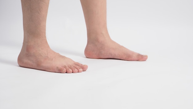 Asian Male barefoot is isolated on white background.