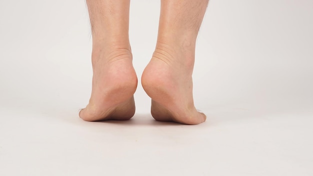 Asian Male heel barefoot is isolated on white background.