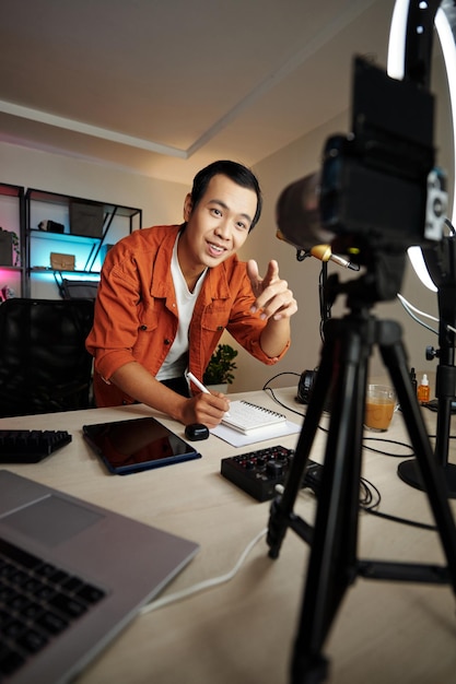 Asian Man Creating Content For Blog