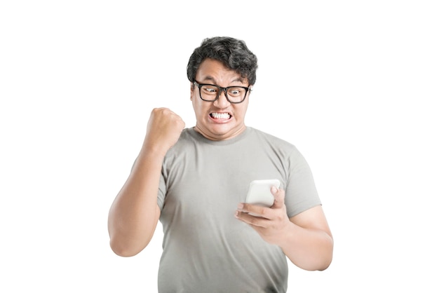 Asian man in eyeglasses with excited expression isolated over white background